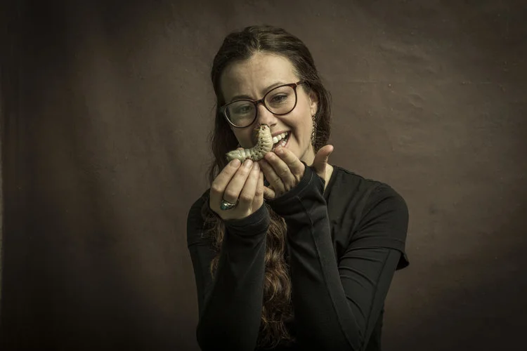 Dr Sarah Beynon with a beetle larva Photo: Paul Mussos for Hay Festival 2017