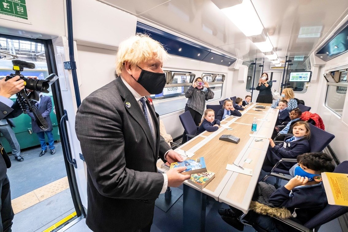 Boris Johnson holding Kidnap on the California Comet on board the HydroFLEX