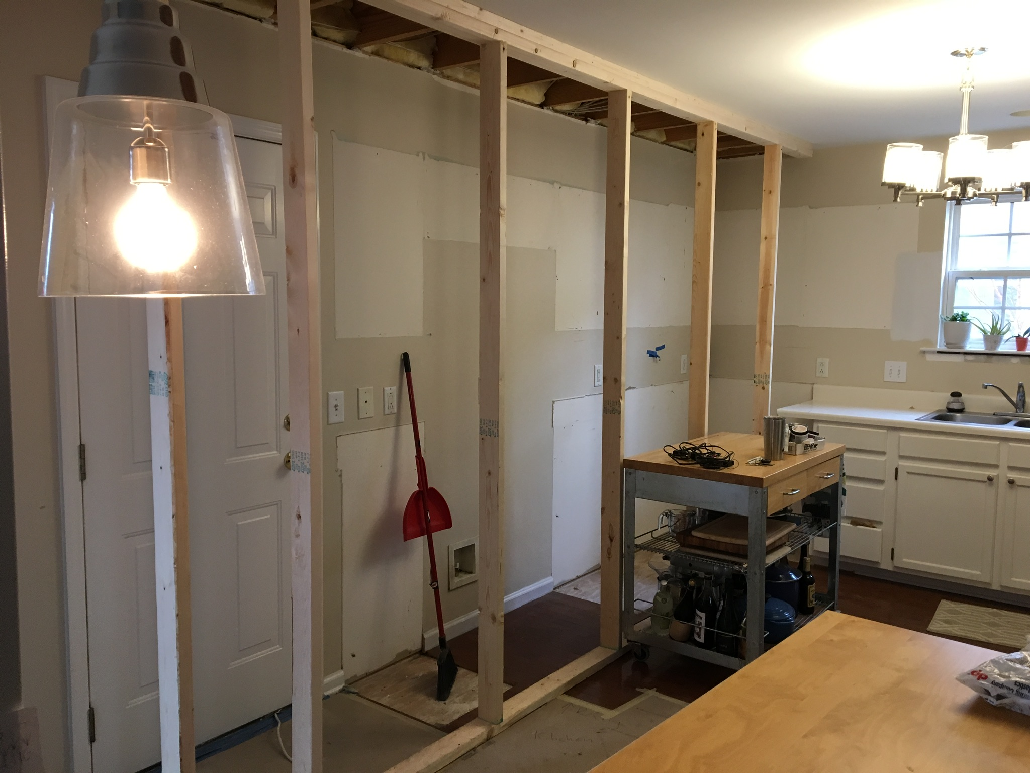  walls to the existing garage came down and the floors were raised 