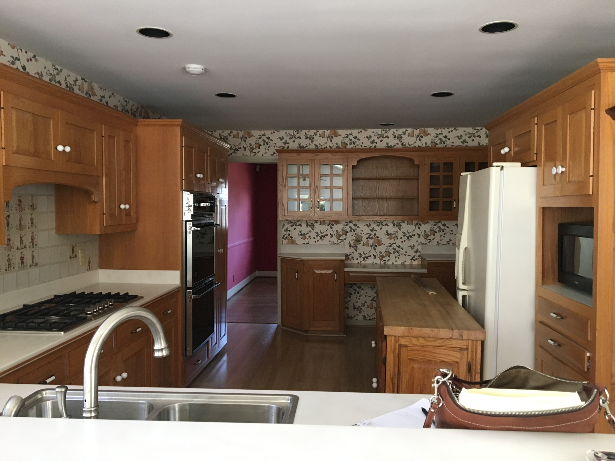  all upper cabinets came down for that open shelving farmhouse style. 