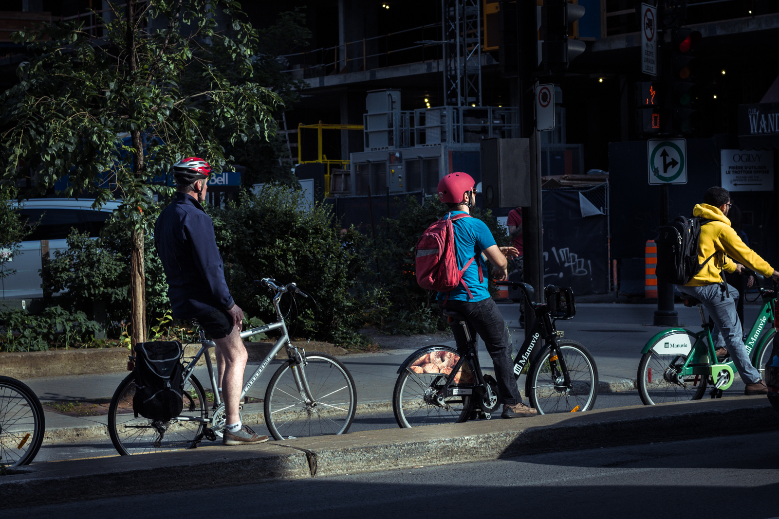 The summer fills the downtown streets with cyclists.
