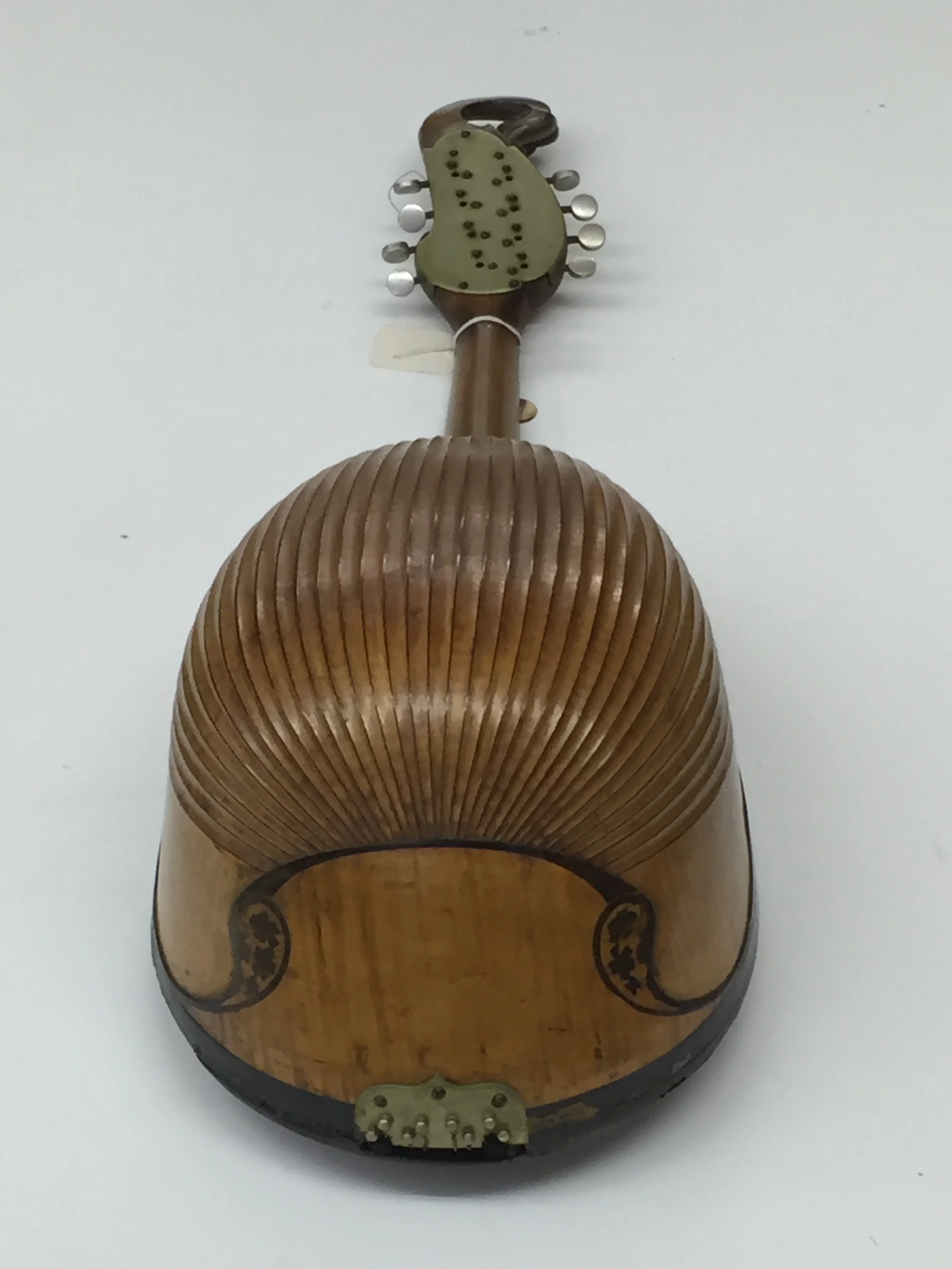 Unusual Italian mandolin: note top of fretboard, below.