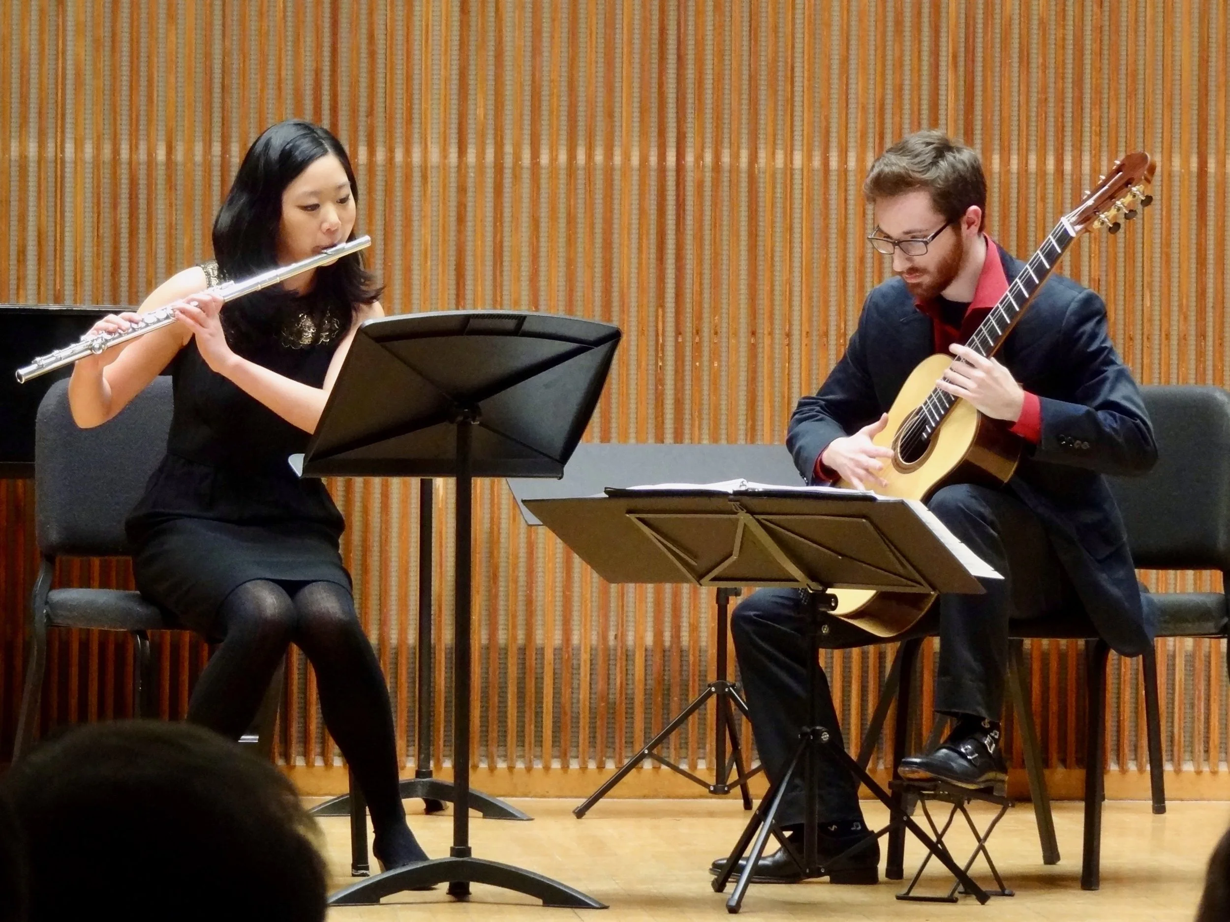 Finally, Katie Kim and Brian King played the amazing Ourkouzounov Sonatine, complete with singing through the flute, the guitarist tapping and singing along, and sundry whoops, screams and hollers, all in 5/8 an 7/8. It was great!