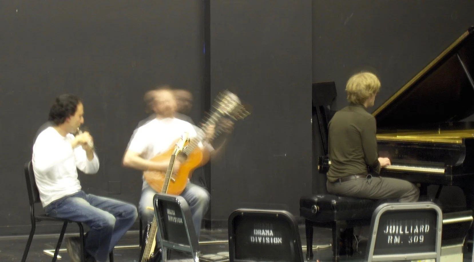 Adam on classical guitar with flutist Arto Artinian and Jonathan Vincent on piano, at a music festival at Juilliard (2003)