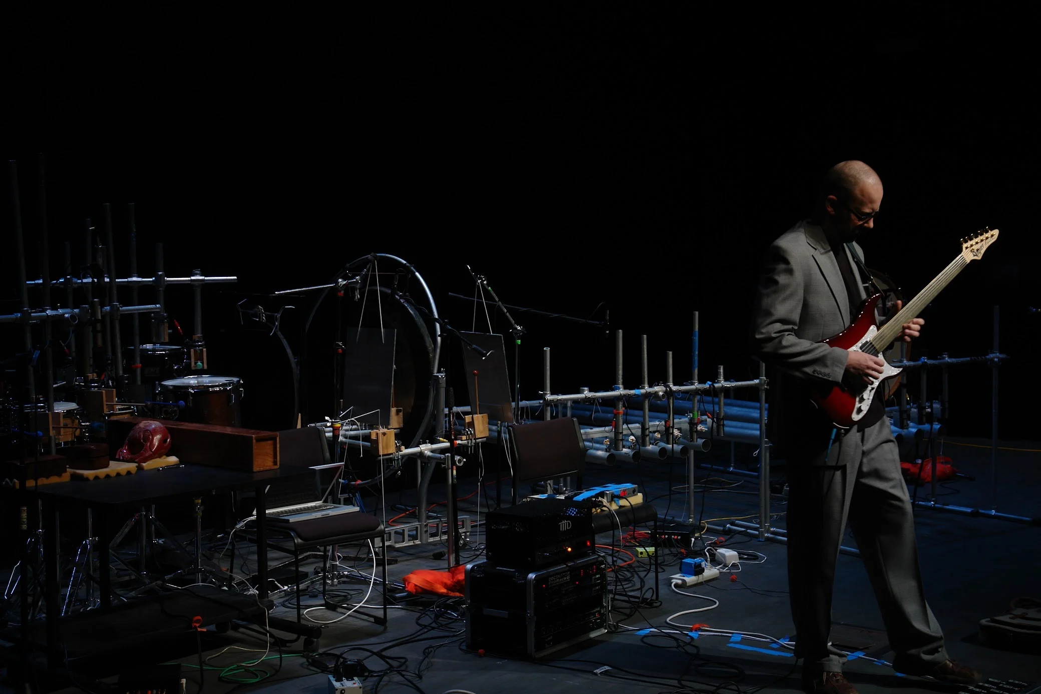 Adam performing with robot percussion array in Duoquadragintapus.