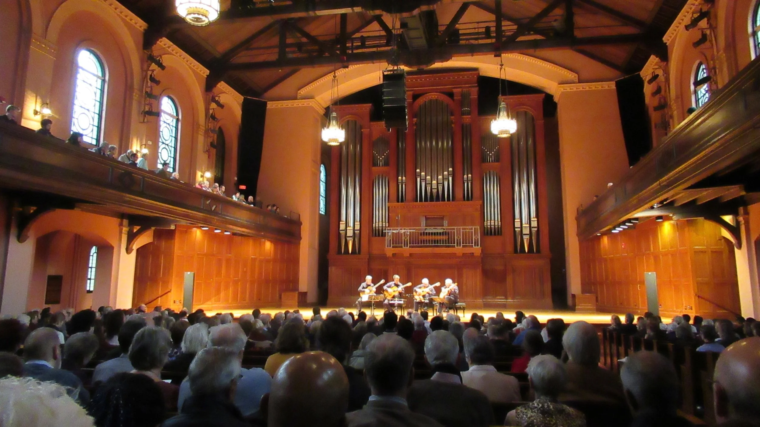 Los Romeros command the stage of Finney Chapel at Oberlin College