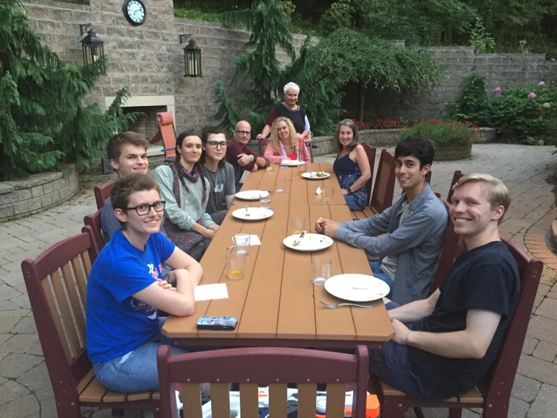 L-R: Caeli, Craig, Kat, Julie, Jim and Jen, Sue (standing), JoNell, Suvan and Aidan