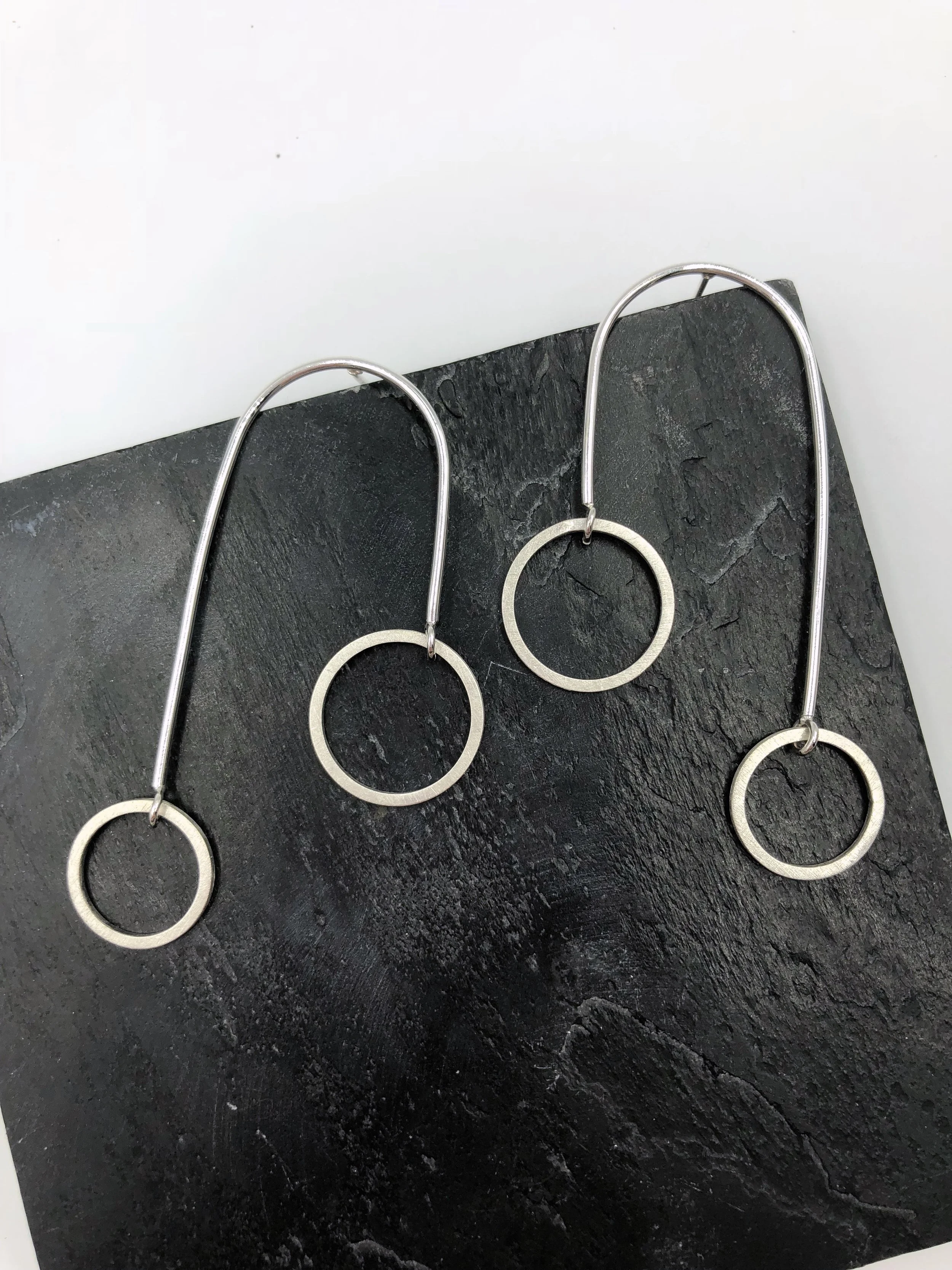 Hooked Post Earrings Item #: E2006 Size: 2.5” long, 1.5” at the widest point Wholesale Price: $23 Suggested Retail: $45