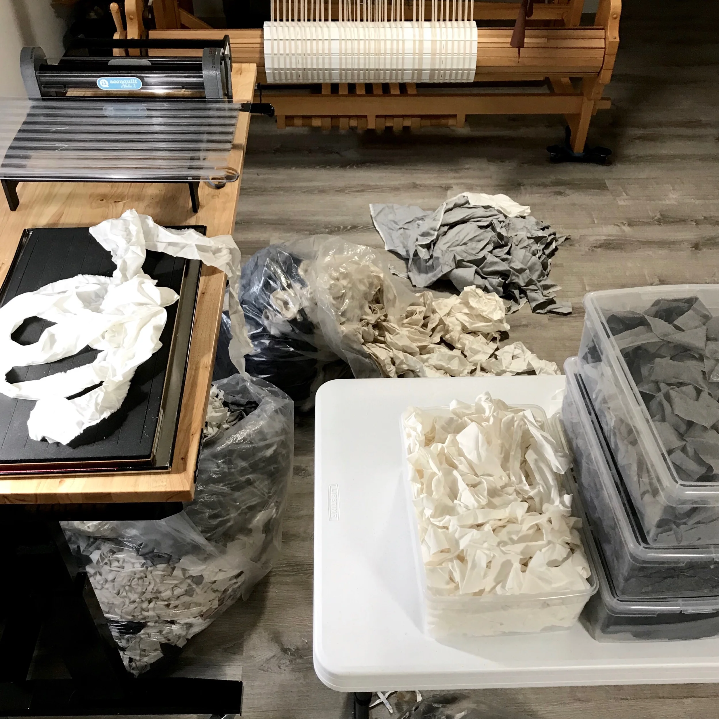 Prepping fabric into strips for weaving.