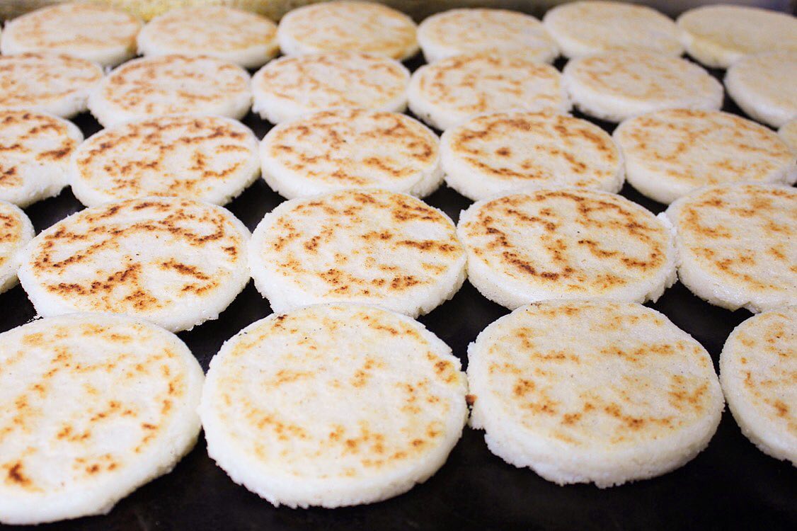 fresh arepas on grill (contact us).jpg