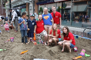 Team CHEO and their superheroes play in the sandbox