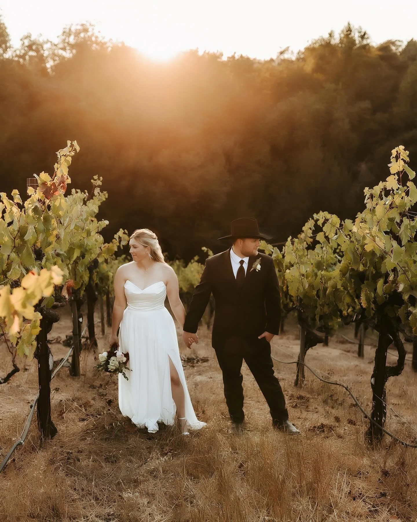 Surrounded by vineyards at Stephanie&rsquo;s family home that has been a special spot for generations, she and Tommy were married in a newly landscaped yard. This backyard was transformed over the last several months and it was the perfect location f