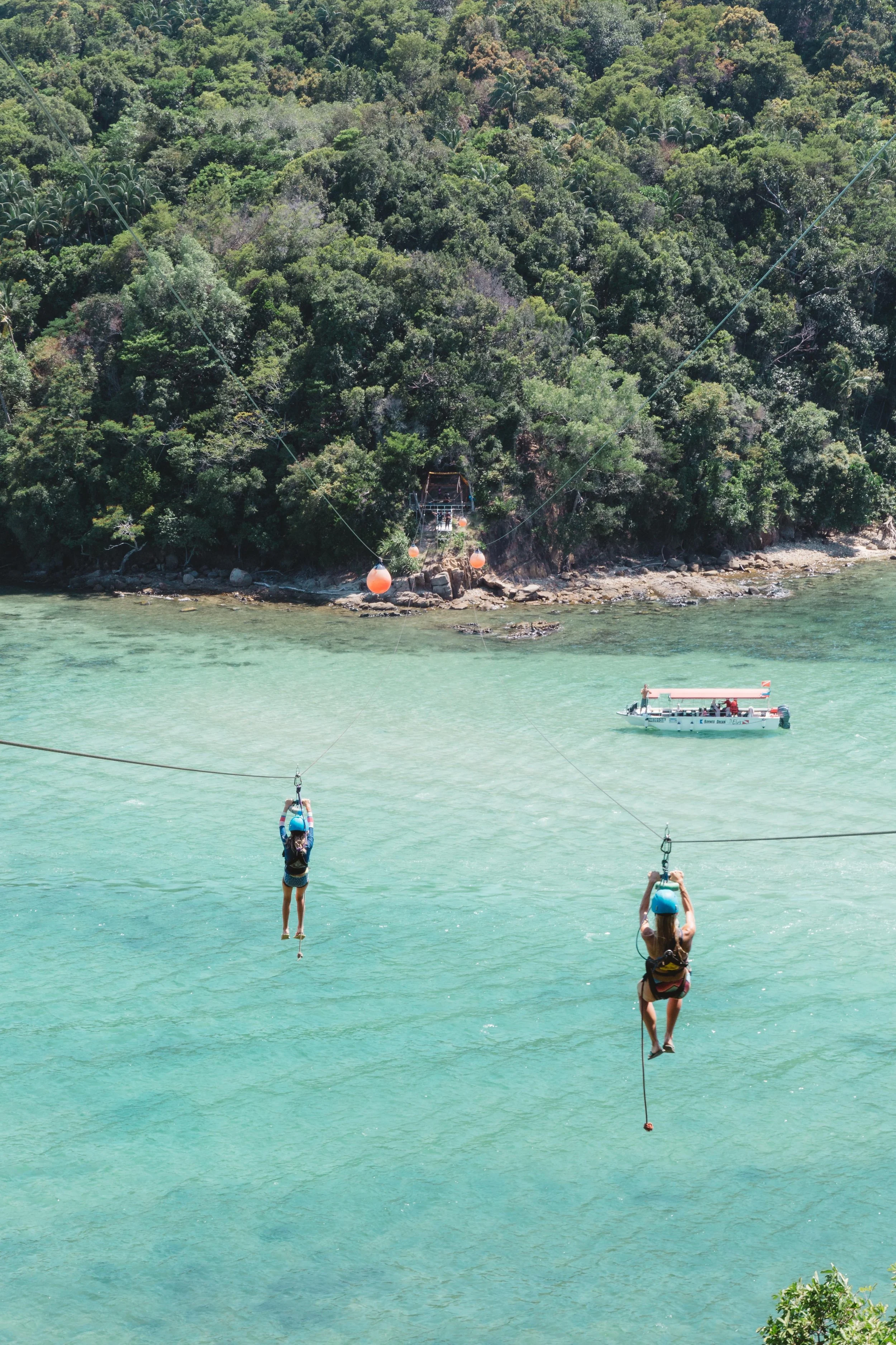 Our new preferred mode of transportation!!!!!! So much fun taking the longest island to island zip-line in the world, while enjoying a day trip snorkeling in Kota Kinabalu, Malaysia. What a pretty view to take in mid-fight!