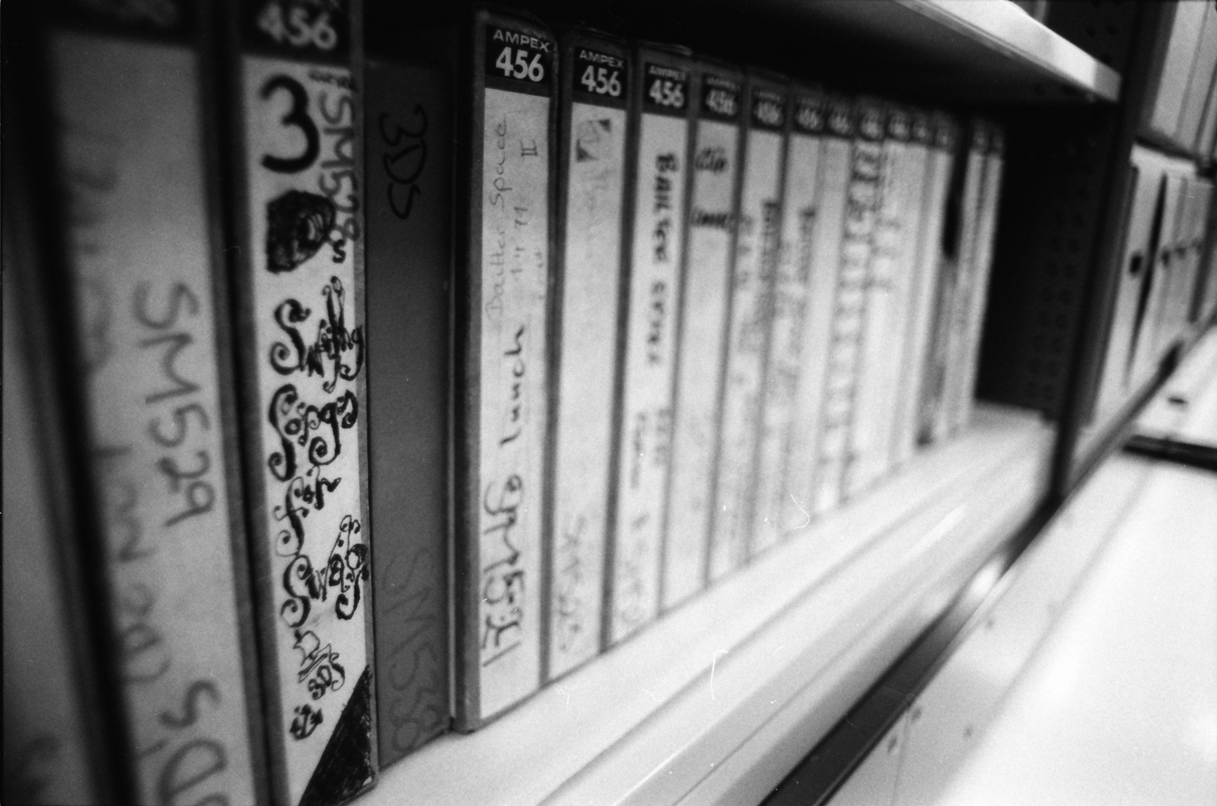 Some of the Flying Nun master tapes - photo taken with b&amp;w Illford Delta 35mm film, Nikon FE2 Nikkor 24mm f2