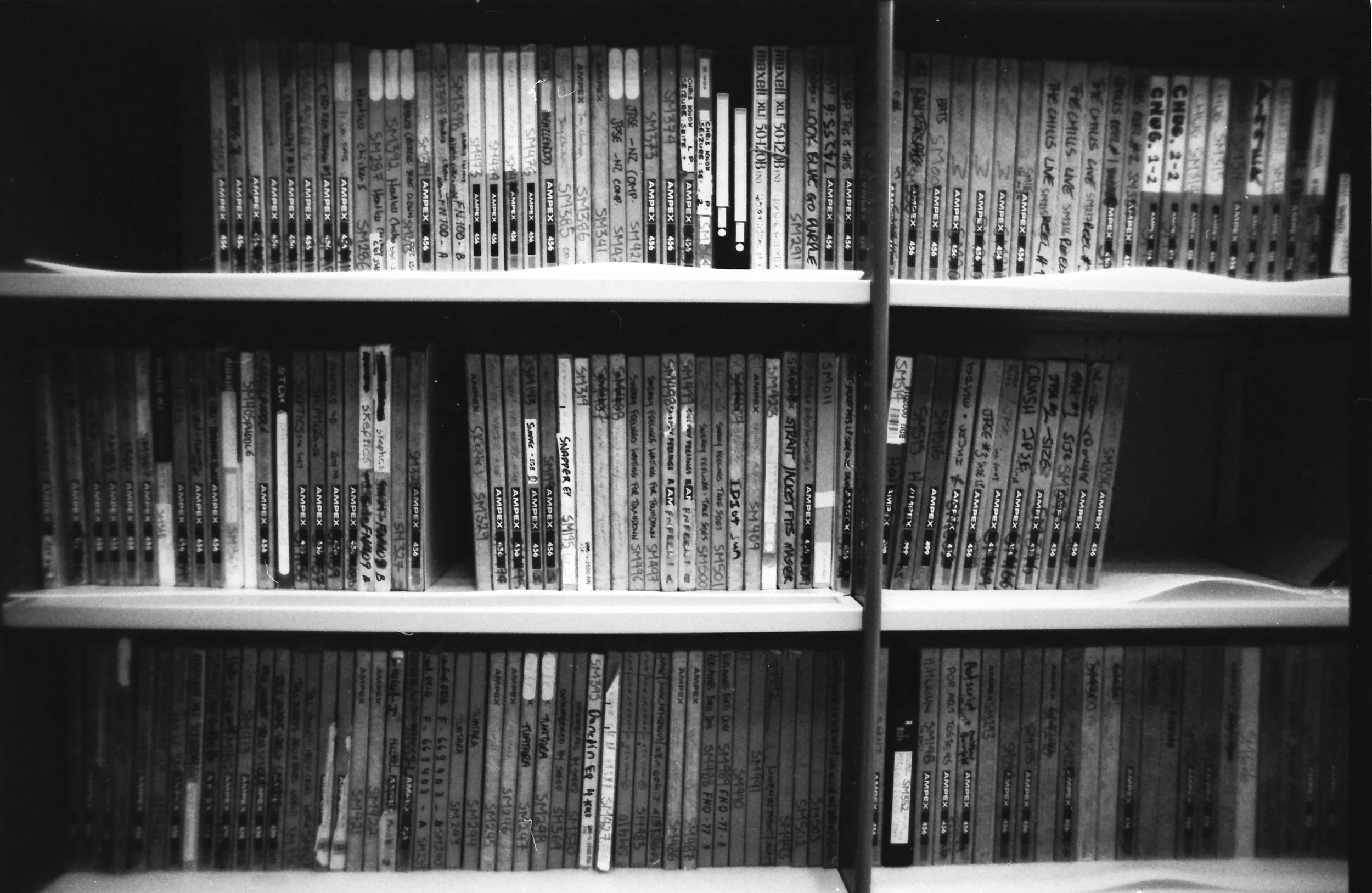 Some of the Flying Nun master tapes - photo taken with b&amp;w Illford Delta 35mm film, Nikon FE2 Nikkor 24mm f2
