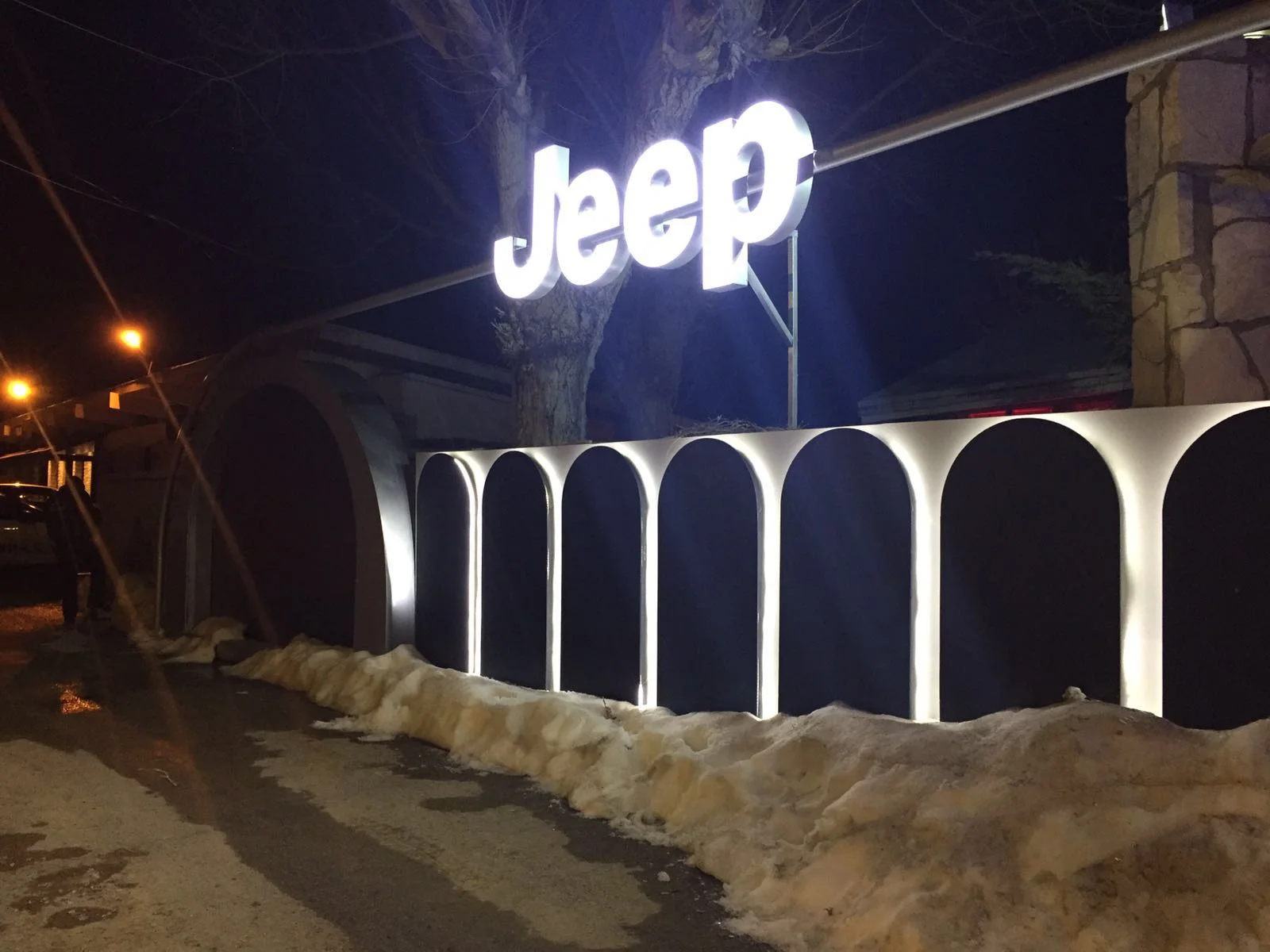   Ambient   Branding at Igloo which has an arched entrance, adding a second one to emulate Jeep's iconic 7-slot grill.  