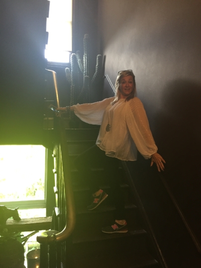 Tina on Abigail Ahern's stairs shortly before the bannister broke