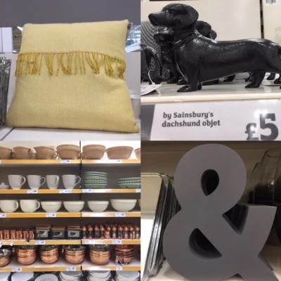 Clockwise from left: Pale mustard fringed cushion £14, very cute black dachshund ornament, large ampersand £10, lovely display of copper kitchenware.