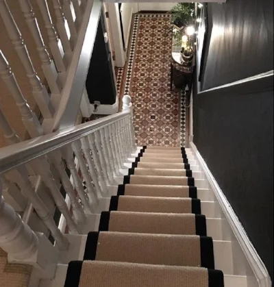 Stunning floor and neutral runner in Karla Lucas 's hallway.