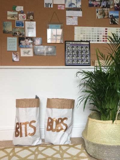 Cool hand printed copper word storage bags hold all the random stuff.