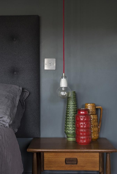 Wendy's home is perfect for displaying her amazing collection of West German pottery. Photography by David Cleveland .