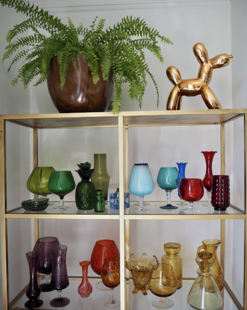 A healthy fern. And my small but gradually increasing coloured glass collection.
