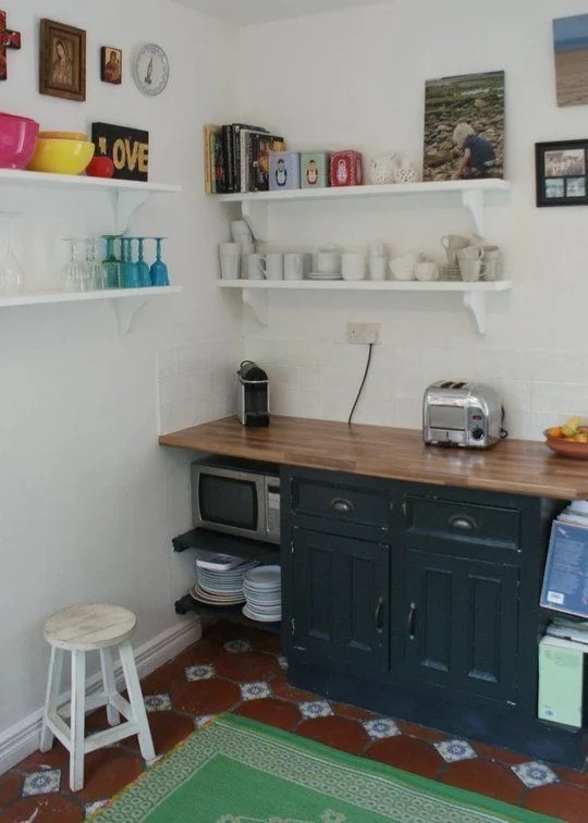 My Albert Road kitchen. The start of my kitsch/tat/general shite wall collection.