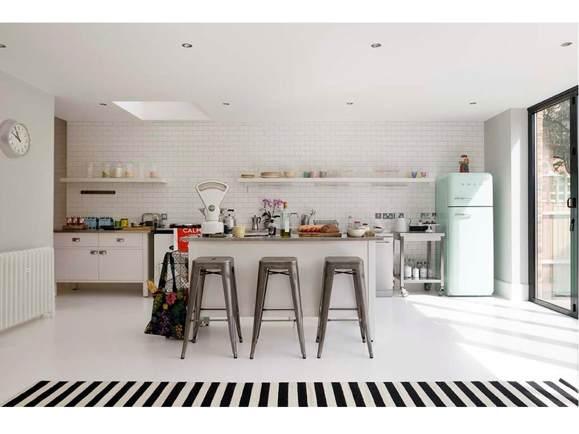 The home of Mairead Fanning, my dream kitchen. Obsessed with the poured resin floor.