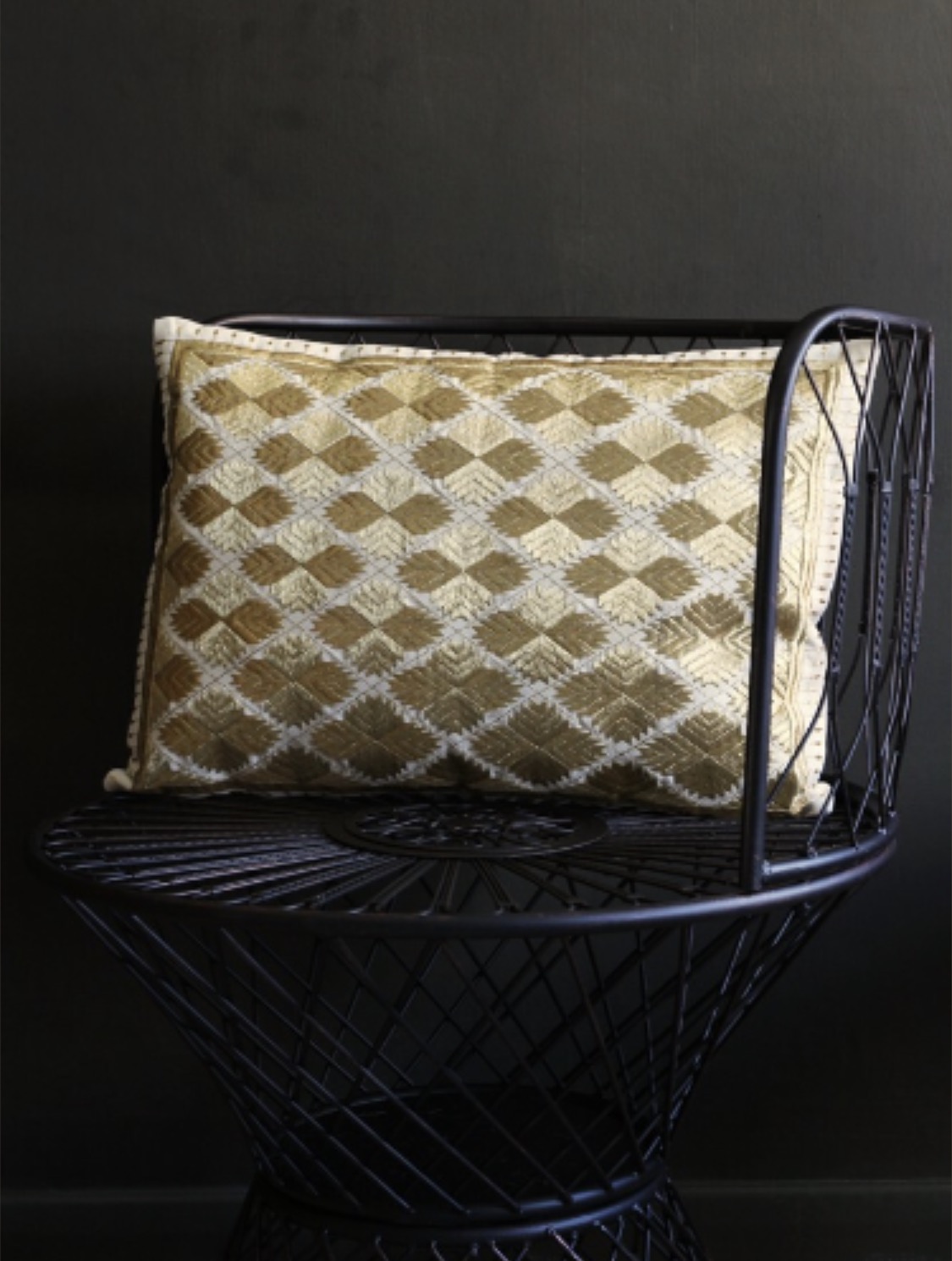 4. Marrakech Diamonds Cushion - Rectangle Gold Metallic £39.50. Modern take on the Moroccan cushion really gives this an edge.