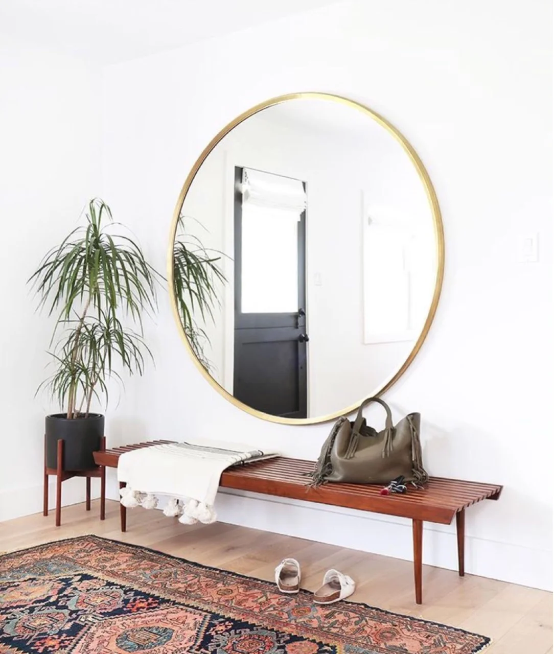 A big mirror, round or rectangular, is a must have. Selfie City. Designed by Amber Interiors .