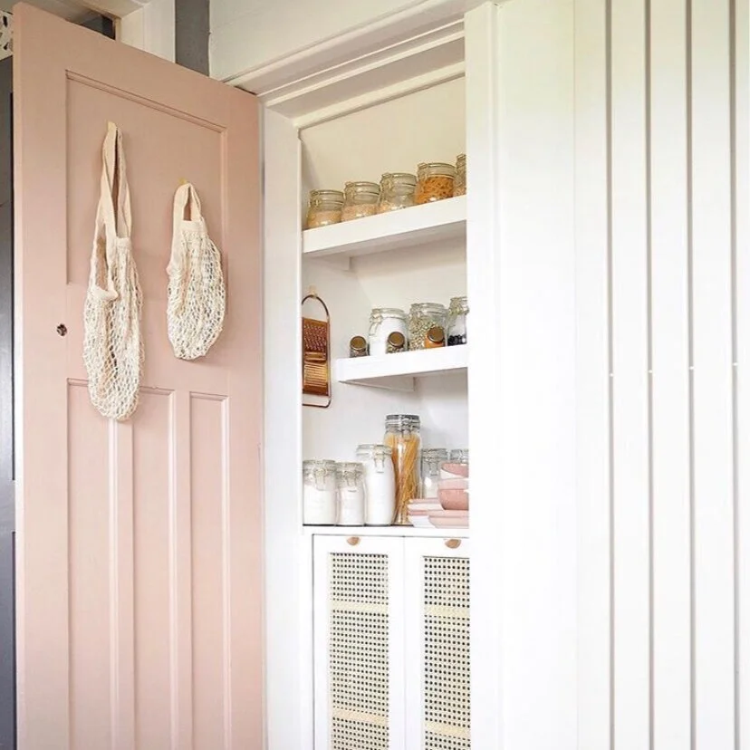 Painting a door is the perfect colour pop in a neutral kitchen: Kitchen, Olivia Silk .