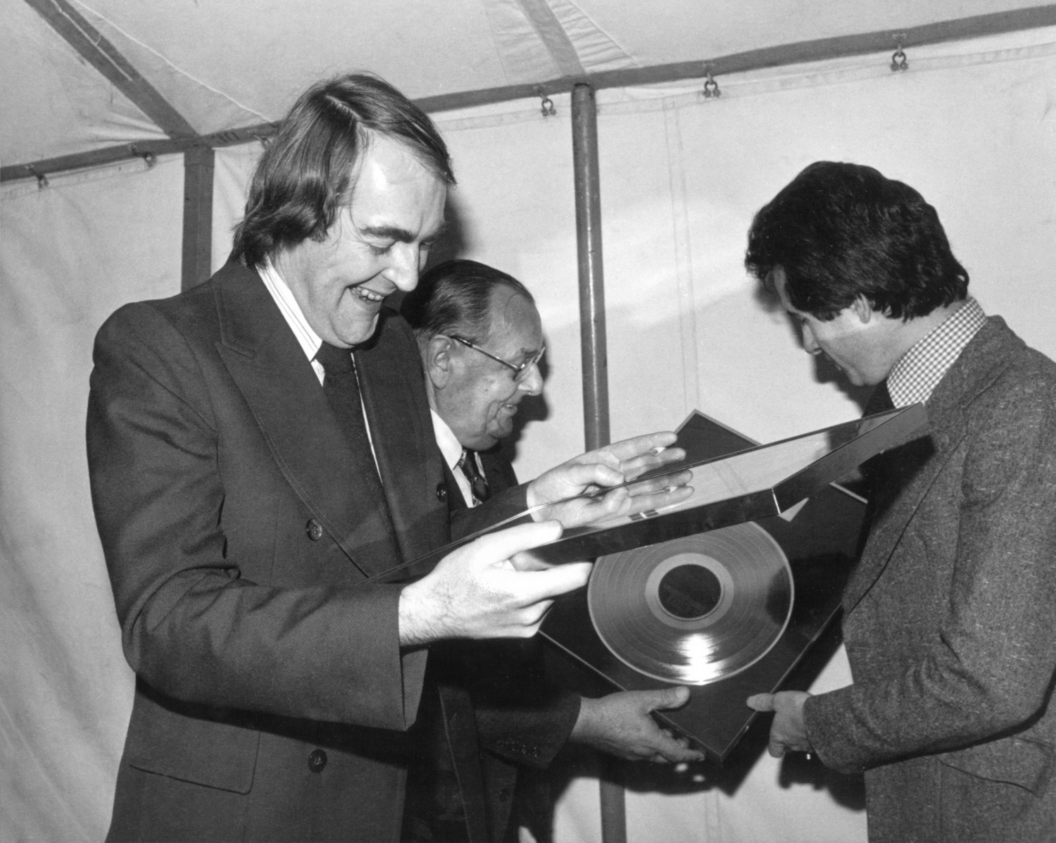 Kevin receiving a gold disc for ten years of work with The Yetties. Bob Arnold (aka Tom Forrest of The Archers) is in the background