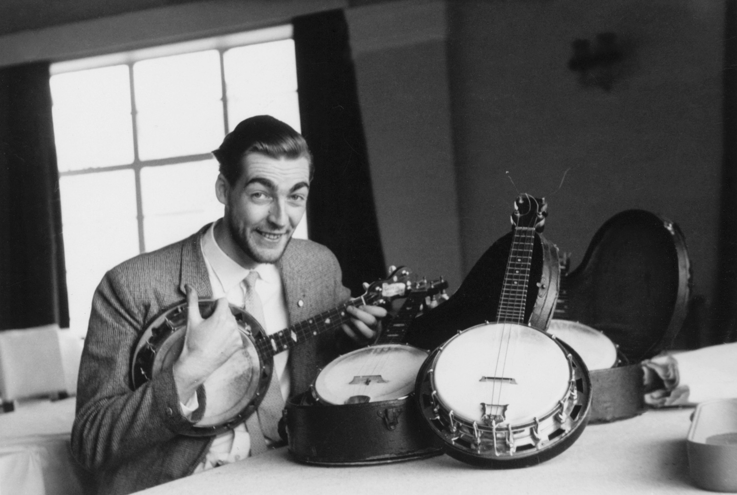 Kevin playing one of George Forby's ukuleles at the George Formby Society meeting in Blackpool, 16 December 1961