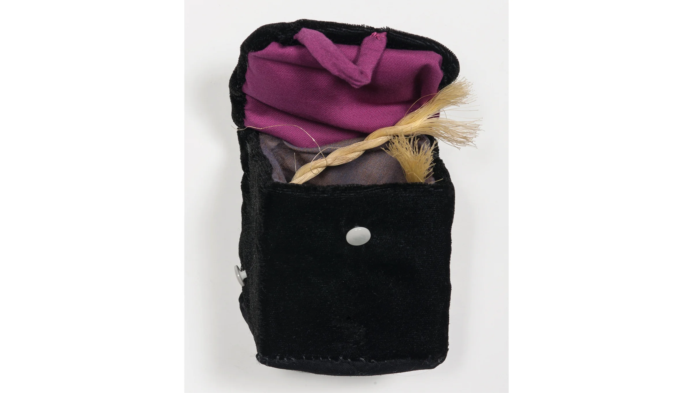 Box, 2011, hand-sewn fabric and buttons over cardboard and found piece of rope, 4.5 x 4 x 4 inches