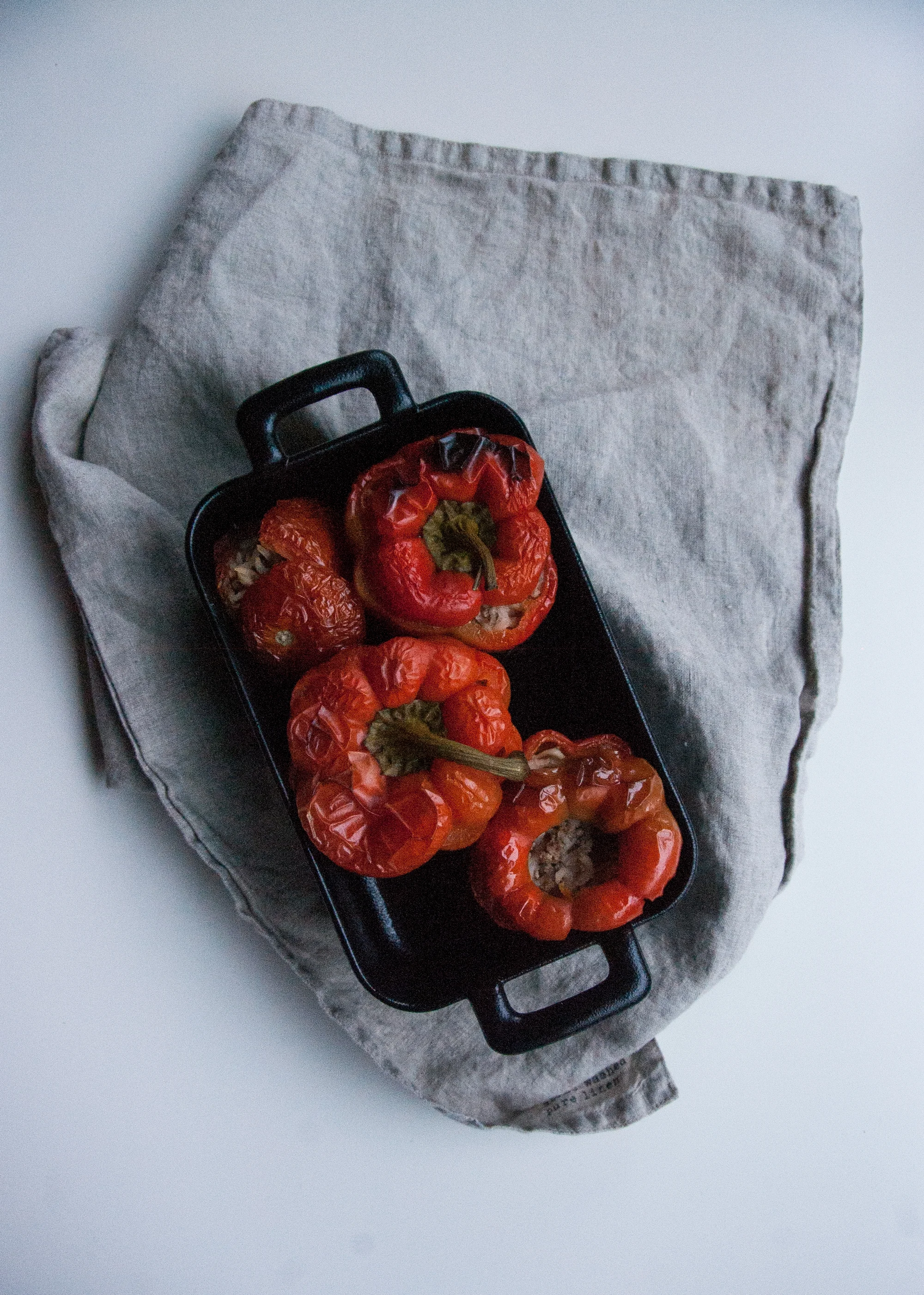 This version of stuffed capsicum is healthy, hearty, and is filled with a flavourful mix of rice and minced lamb. The oven based recipe can also be steamed.