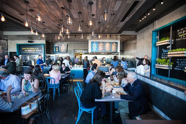 Created all interior signage, menu boards, carryout and catering packaging, beverage containers and promotional materials.
