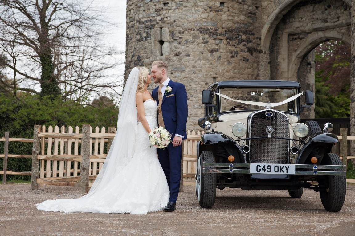 vintage car with bride and groom