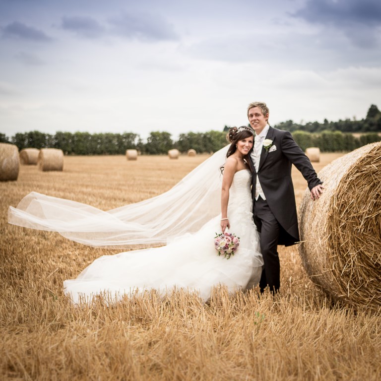 bride and groom in the corn fields