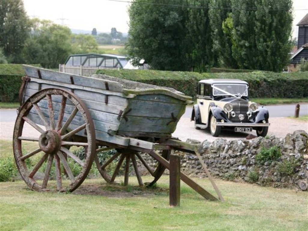 bride arrival with cart in the foreground