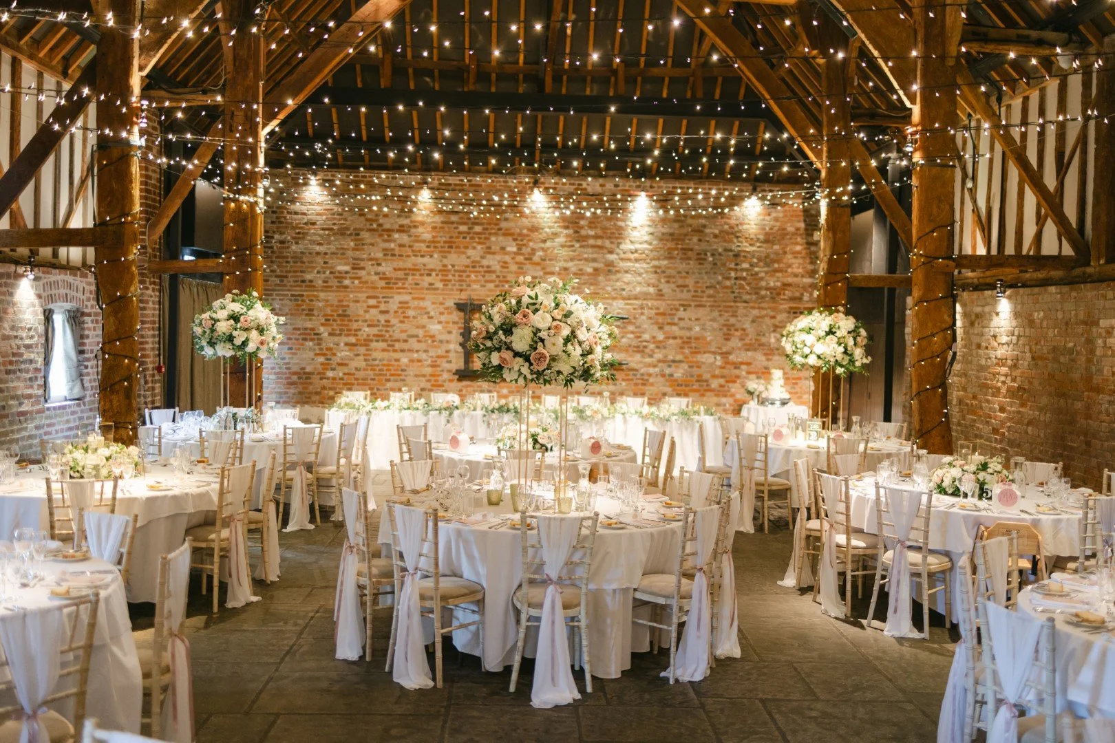 white-circular-floral-wedding-breakfast.jpg