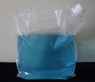 Liquid twist cap pourable spout bag