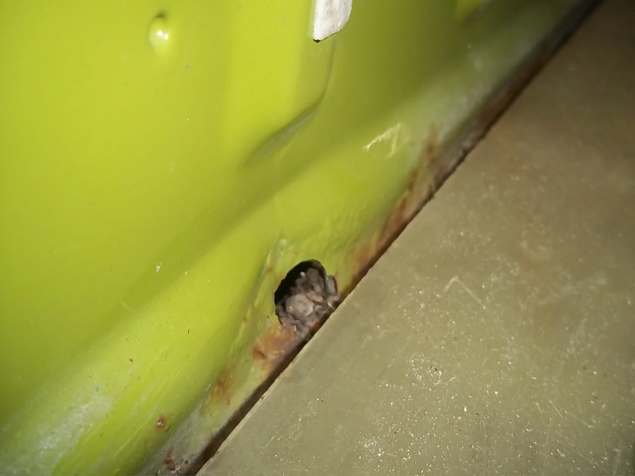 71 Rust hole from cab to bed.JPG