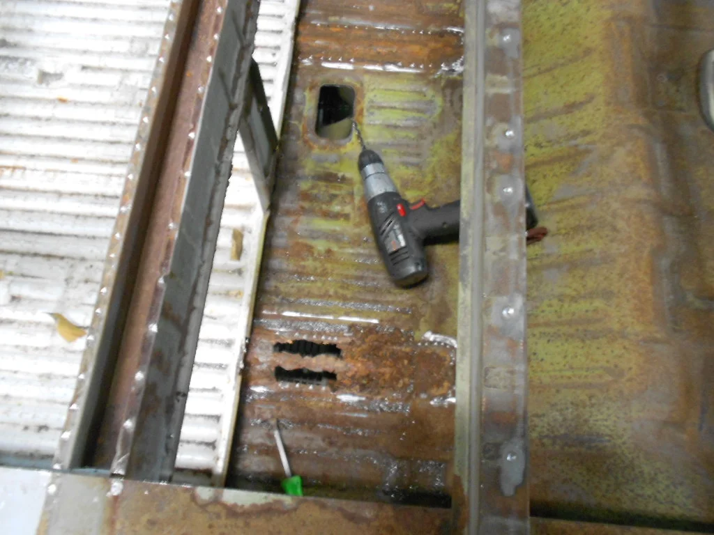 178 Rear floor rust.JPG