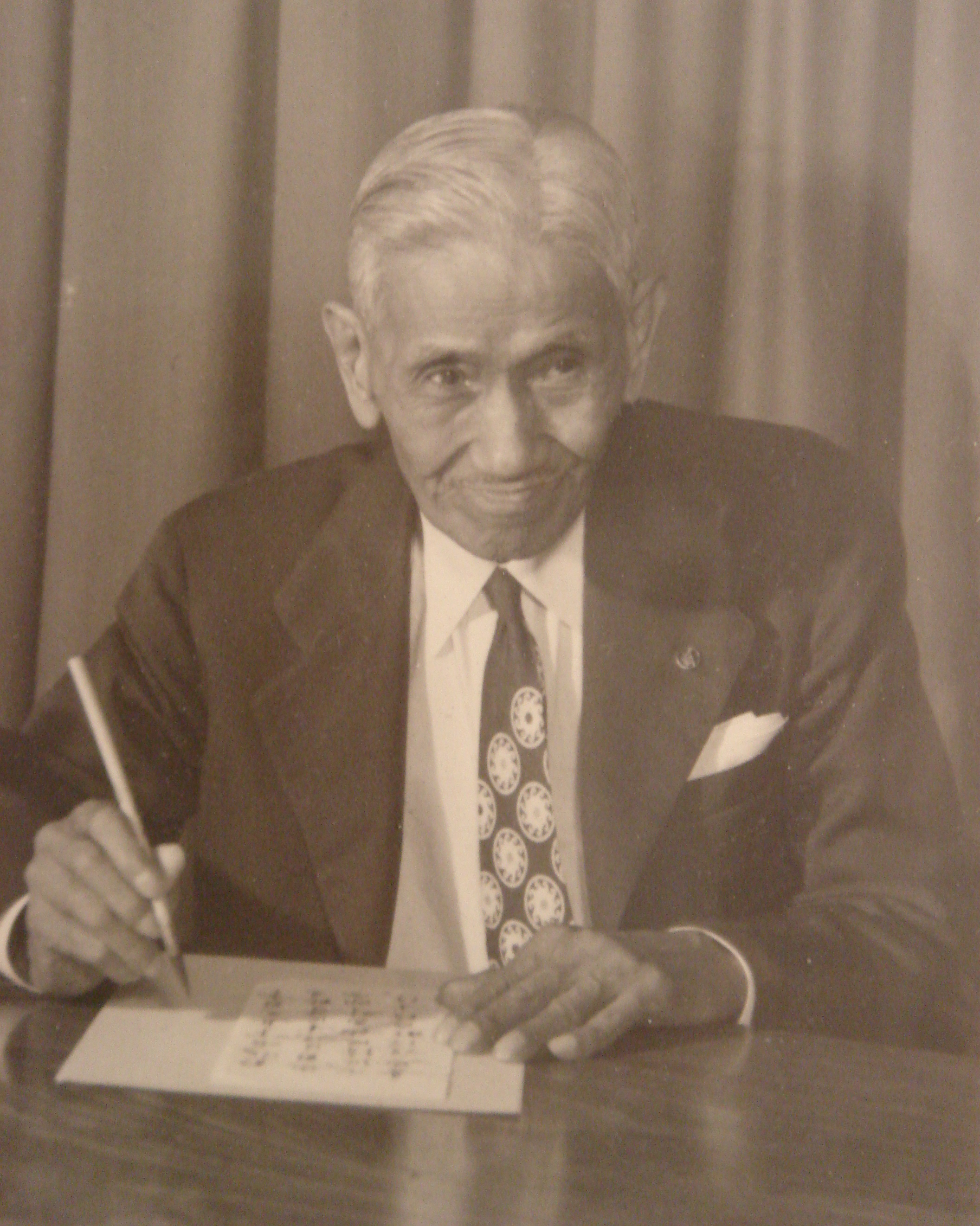 My grandfather, Chung Tai P'eng (aka Robert Chung Chan), at his calligraphy, in Savannah, Georgia ca. 1933. Photo taken by my father.