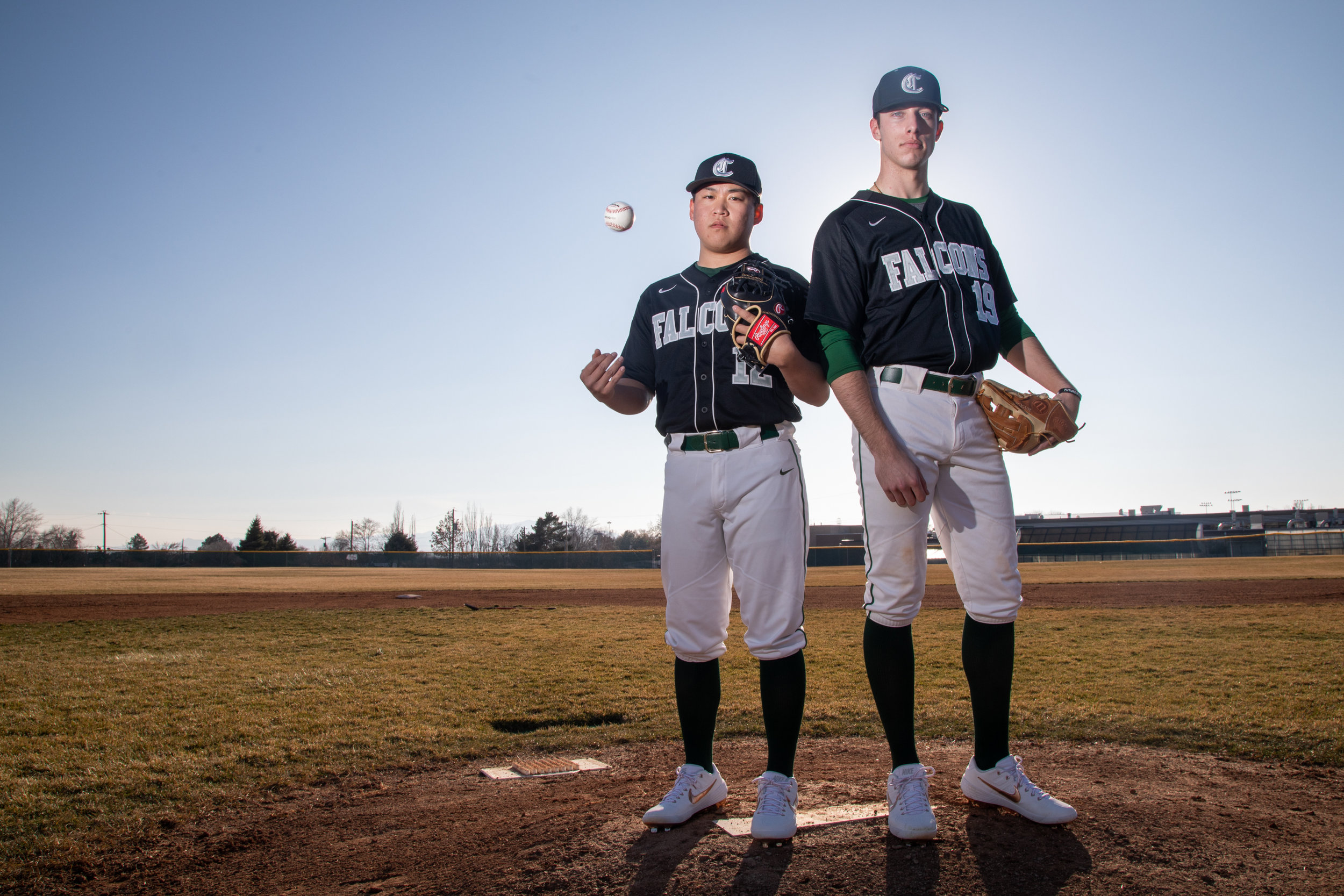  Clearfield High pitchers, Bryson Hirabayashi, left, and Conner Coleman pose on the mound at the high school on Monday, March 11, 2019. 