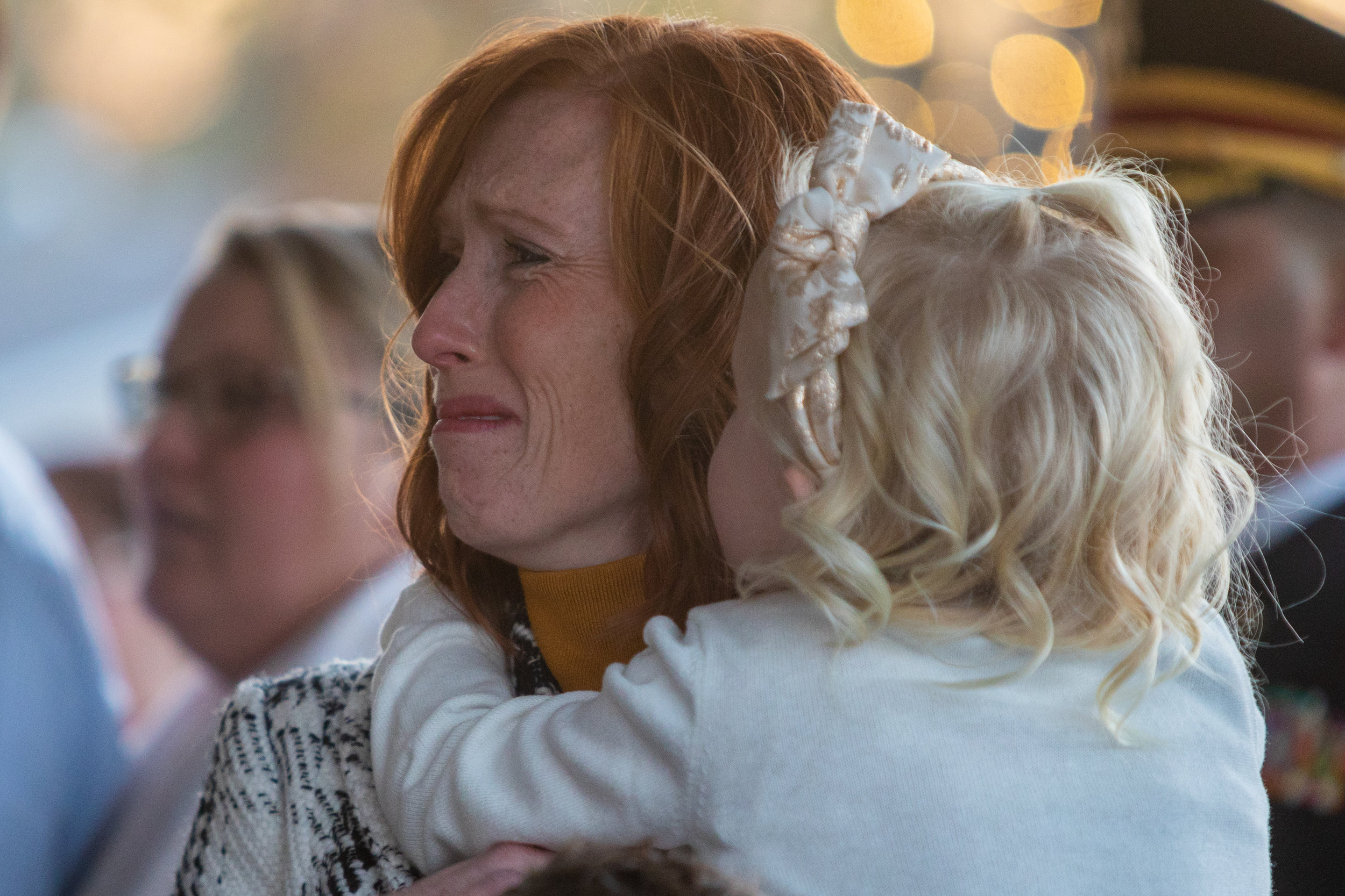  Jennie Taylor, wife of Maj. Brent R. Taylor, holds her daughter as a casket containing her husbands remains is brought to Myers Mortuary in Ogden on Wednesday, Nov. 14, 2018. Taylor, 39, died Nov. 3, 2018, in Afghanistan of wounds sustained from sma