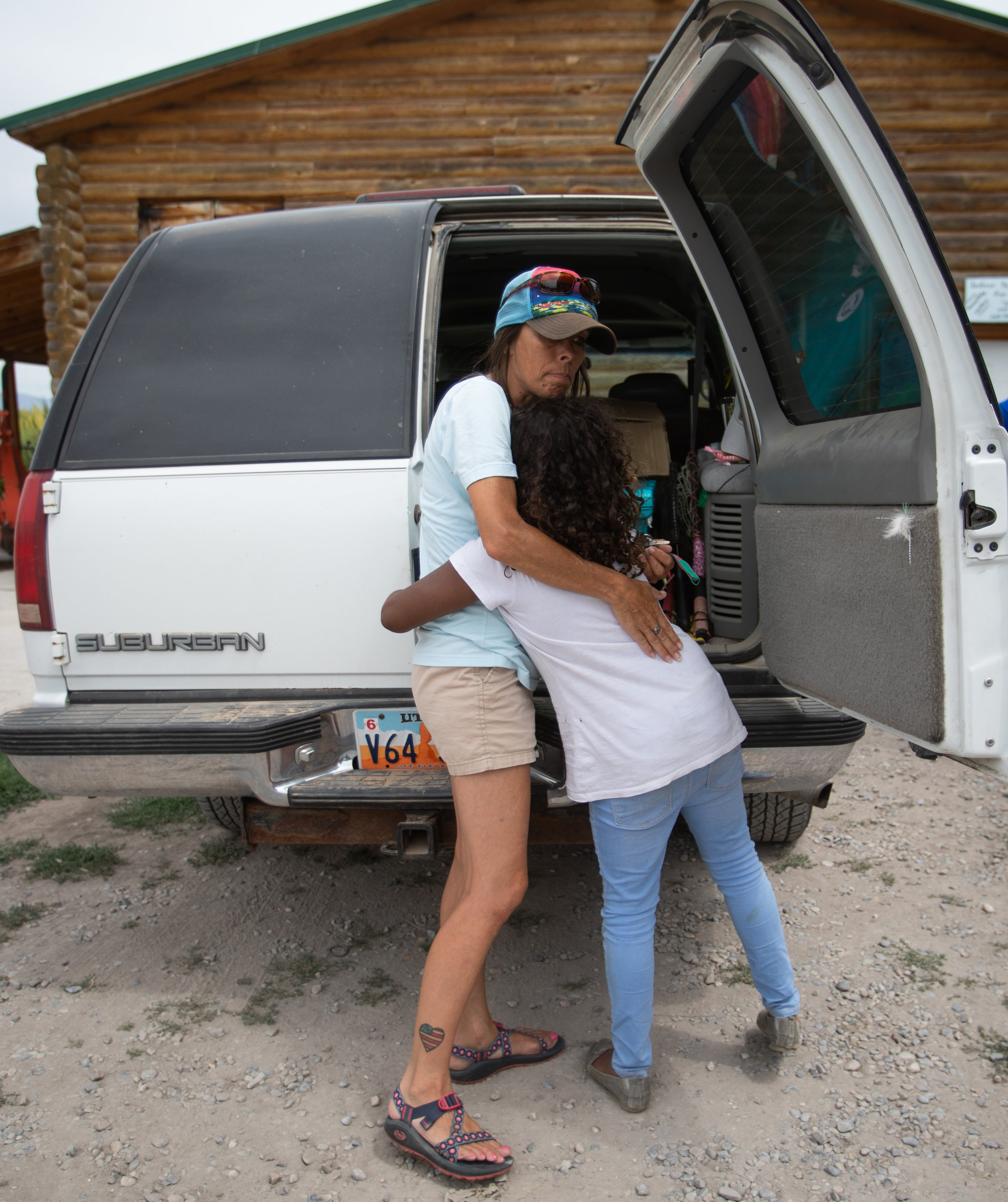  Mariah, 9, hugs Verlicia Perez, lead mentor for The Utah Mayfly Project, after an outing at a trout pond on Saturday, July 14, 2018, in Smithfield. The Mayfly Project is a national non-profit that uses fly fishing to mentor foster care children. Thi