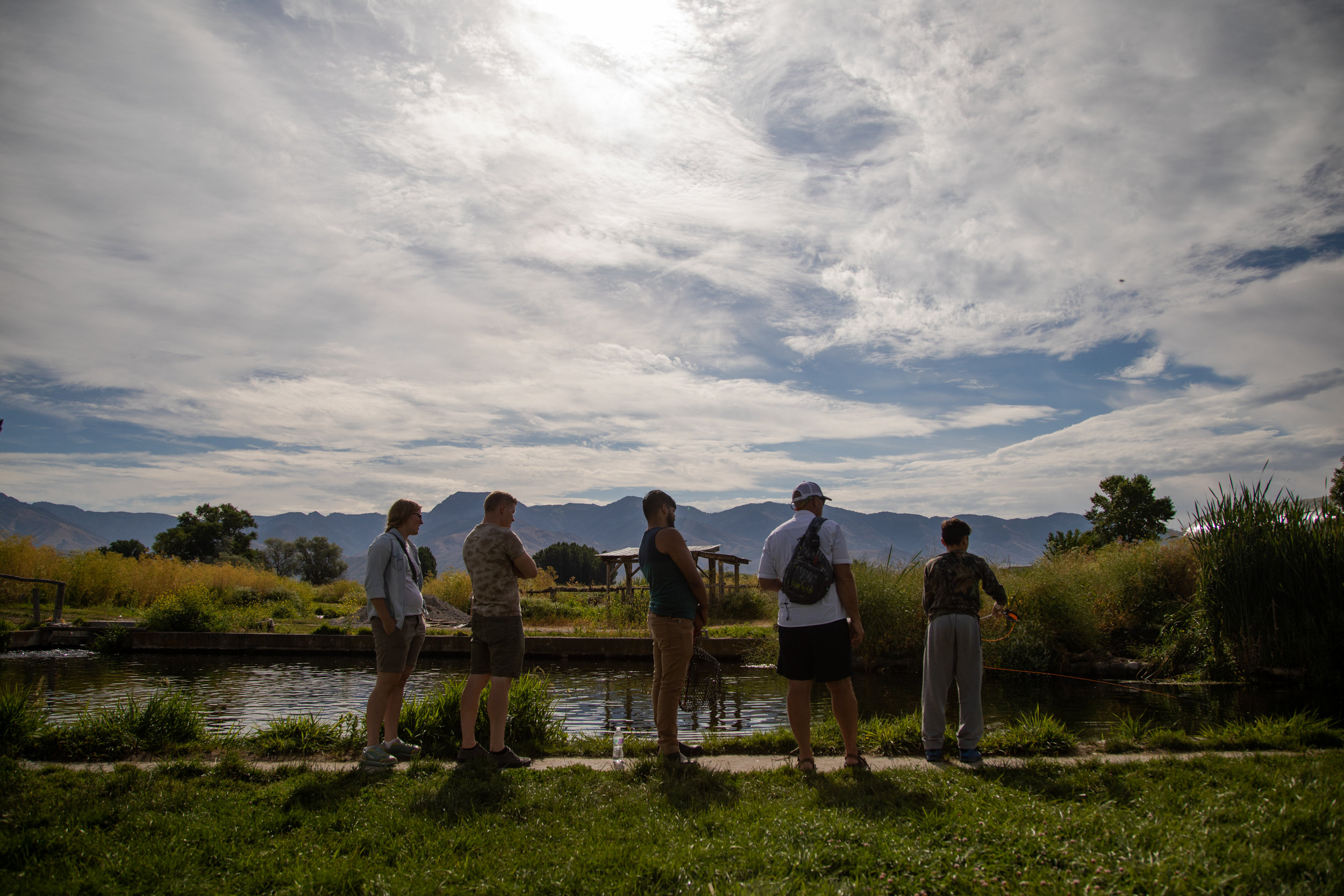  Utah foster care children fly fish on a trout pond on Saturday, July 14, 2018, in Smithfield. The outing was one of several this summer that was part of The Mayfly Project, a national non-profit that uses fly fishing to mentor foster care children. 