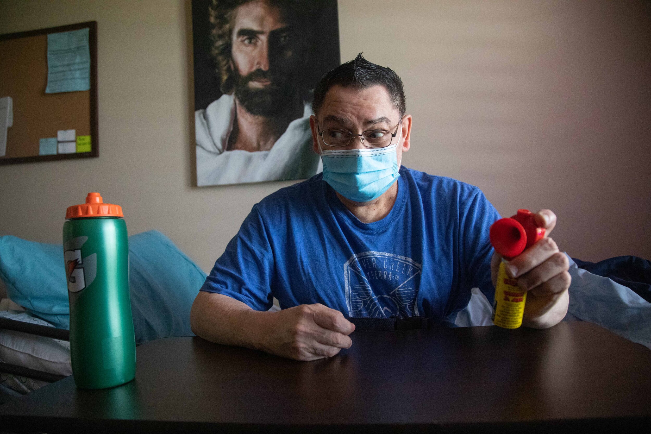  Ron Vigil uses an air horn to get his cousin, Denise Vigil-Thieldfoldt’s attention in the next room on Friday, May 22, 2020, in Syracuse, Utah. 