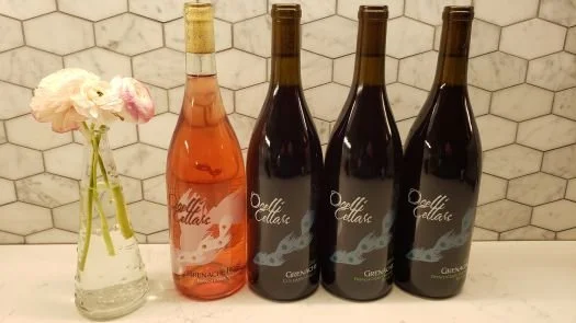 Four bottles of Ocelli Cellars Grenache wine, featured in the Willamette Valley winery's wine club offering exclusive access to limited-production Pacific Northwest Grenache.